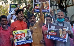 Supporters of Indias main opposition Congress party hold placards as they shout