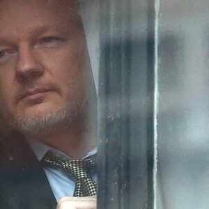 Julian Assange at Embassy of Ecuador CREDIT Carl Court getty